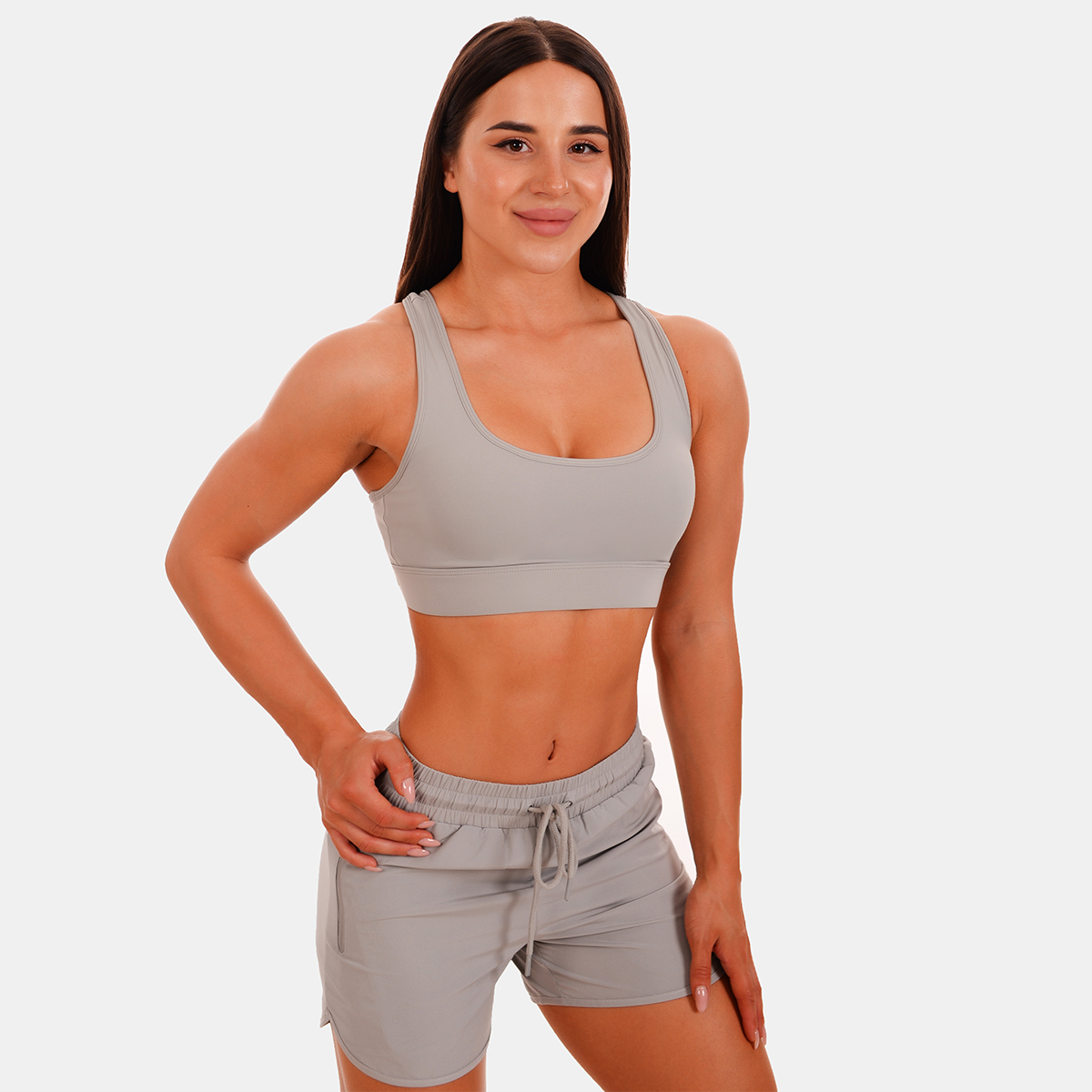 Brassière de sport à panneaux en mesh, couleur gris - GymBeam.