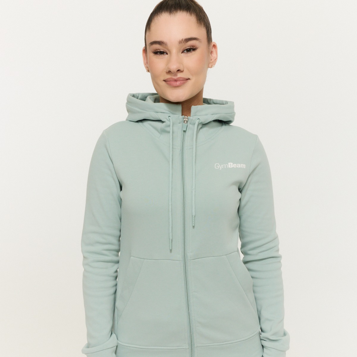 Sweat à capuche zippé pour femmes, modèle Limitless, couleur Eucalyptus - GymBeam.